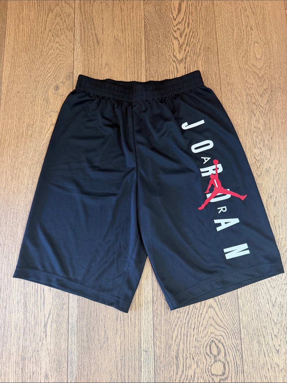 Jordan Black Athletic Shorts with Red Jumpman and White Lettering